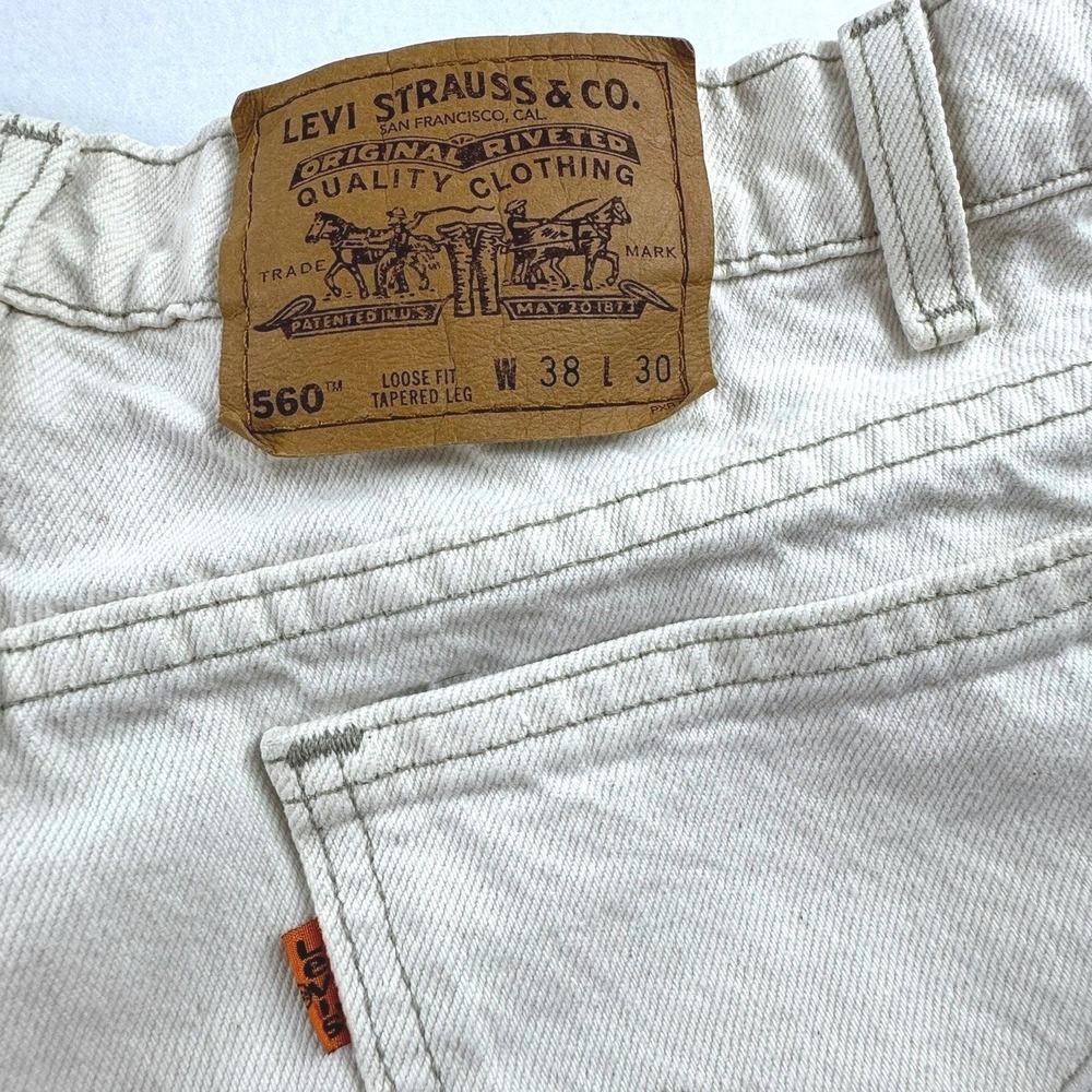 Vintage Levis 560 Loose Fit Tapered Leg Jeans Cream Orange Tab Made in USA 38x30